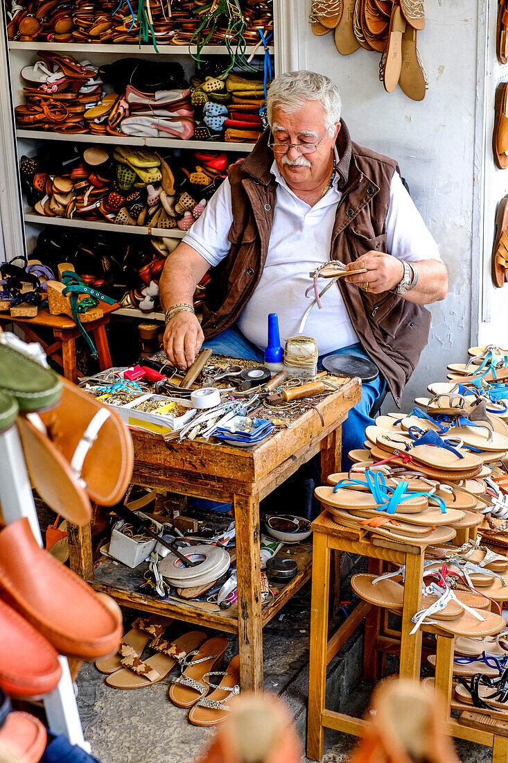 Shoemaker during his work, Capri, Campania, Italy