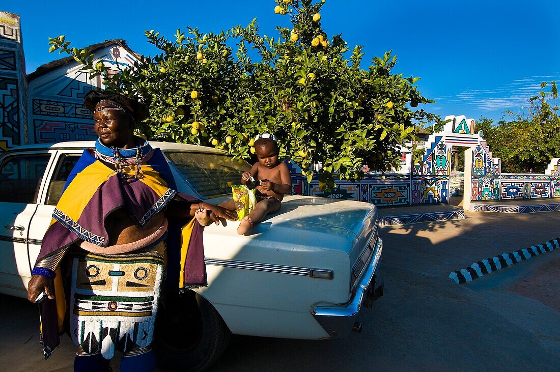 Africa, South Africa, Mpumalanga Province, KwaNdebele, Ndebele tribe, Mabhoko village, the artist Francina Mbonani with her grand son Sanelisiwe