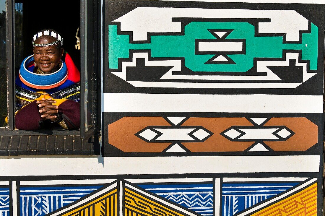 Africa, South Africa, Mpumalanga Province, KwaNdebele, Ndebele tribe, Mabhoko village, the artist Francina Ndimande at the window of her house