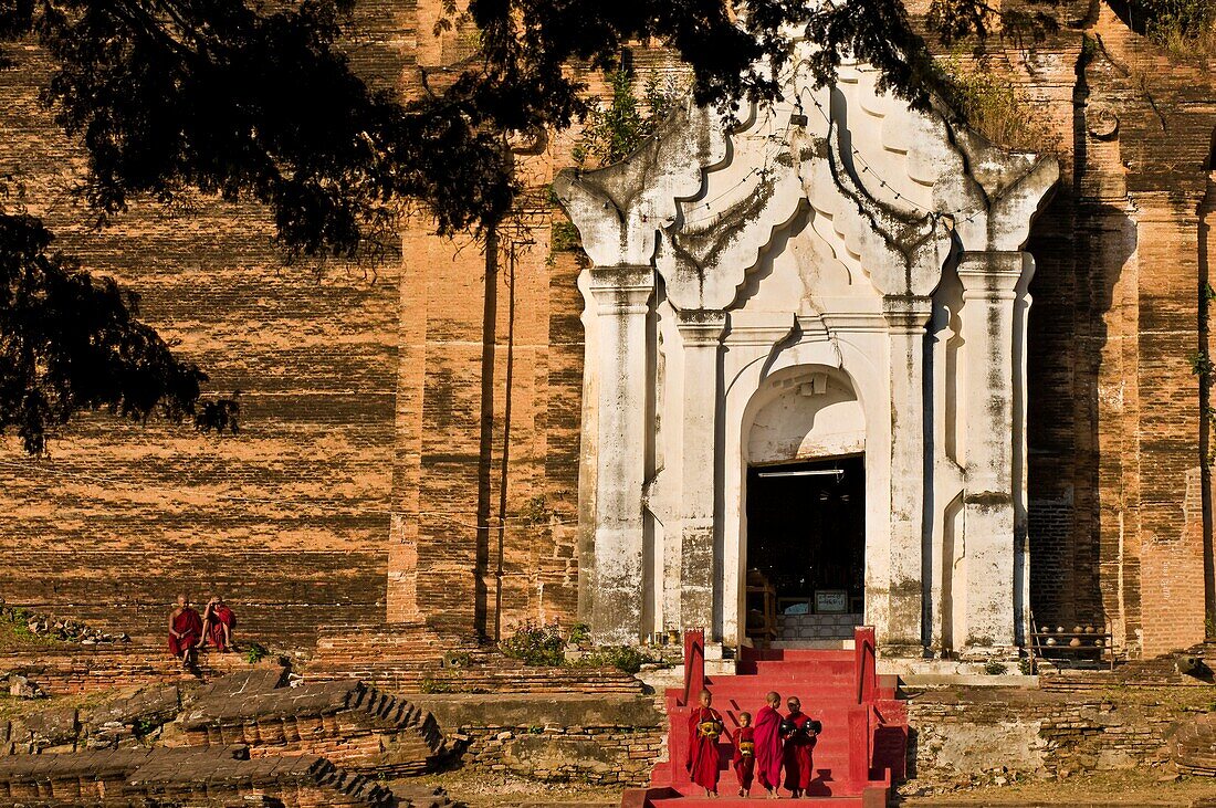 Myanmar (Burma), Sagaing State, Mingun, Mingun Pagoda was built in 1790 under King Bodawpaya who was thinking of building a 150 meters high pagoda but it was finally stopped at 60 meters when the King died in 1819, the cracks have occured with the 1838 ea