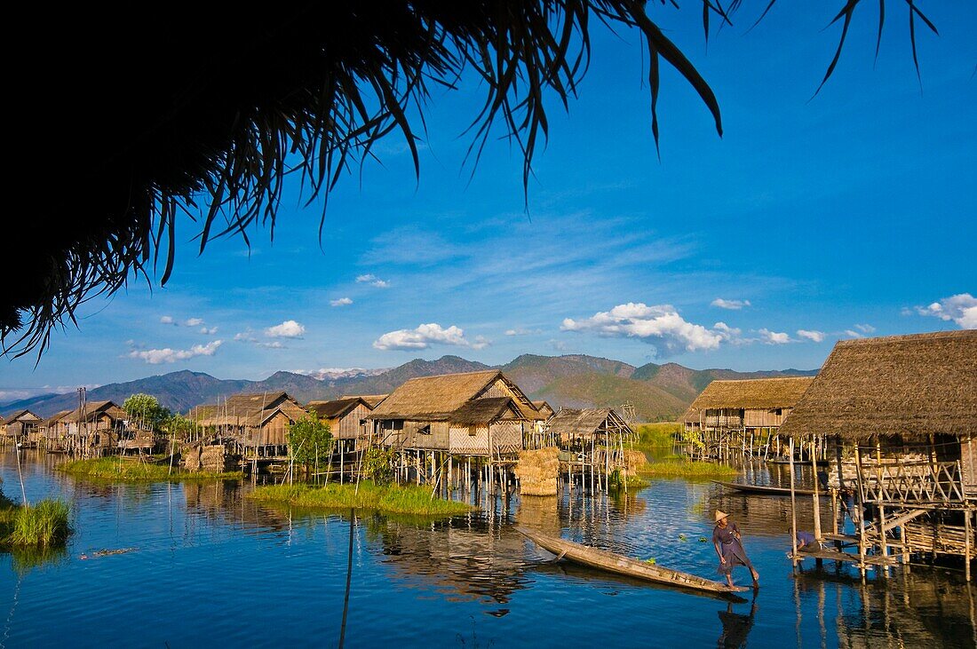 Myanmar (Burma), Shan State, Inle Lake, Pauk Par village, U Thone the fisherman on his canoe