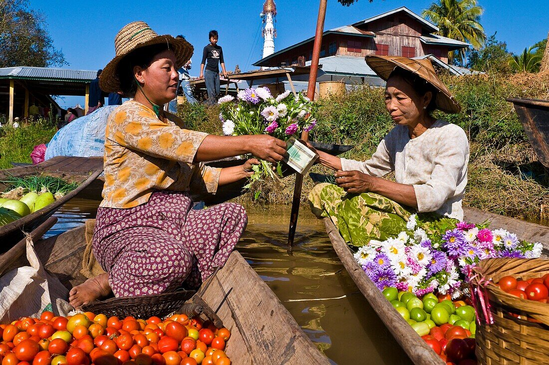 Myanmar (Burma), Shan State, Inle Lake, village of Ywama, Ma Khin Win Myint sells vegetables at the floating market