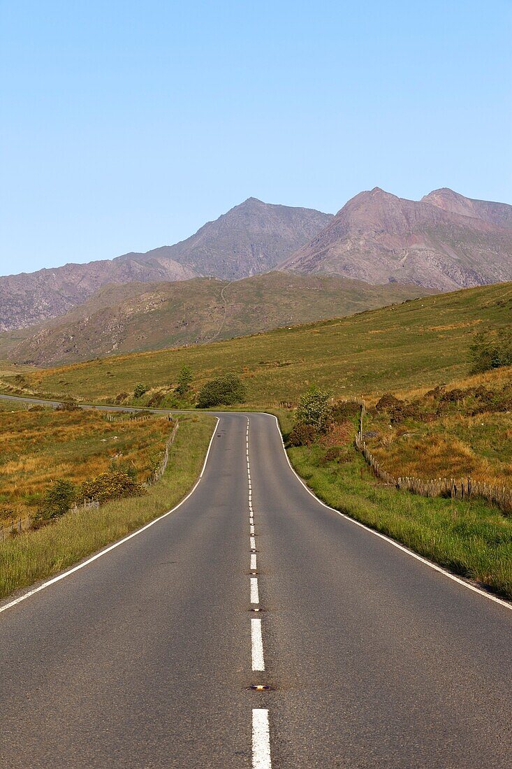Wales,Gwynedd,Snowdonia National Park,Empty Road with Mount Snowdon in Background