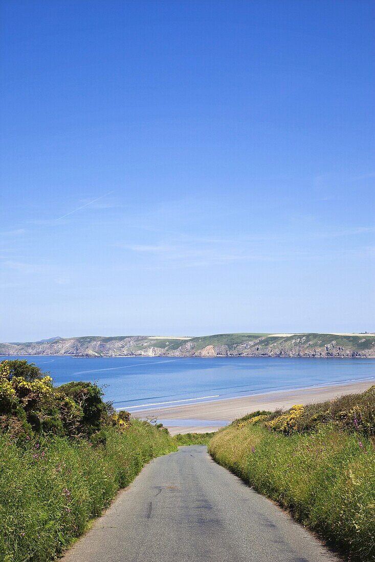 Wales,Pembrokeshire,Empty Road and Beach on Pembrokeshire Coast National Park