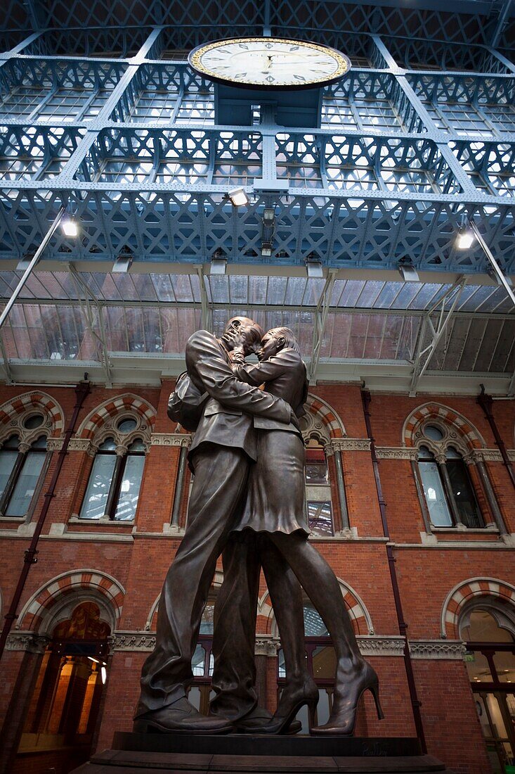 England,London,St.Pancras Station,The Meeting Place Statue by Paul Day