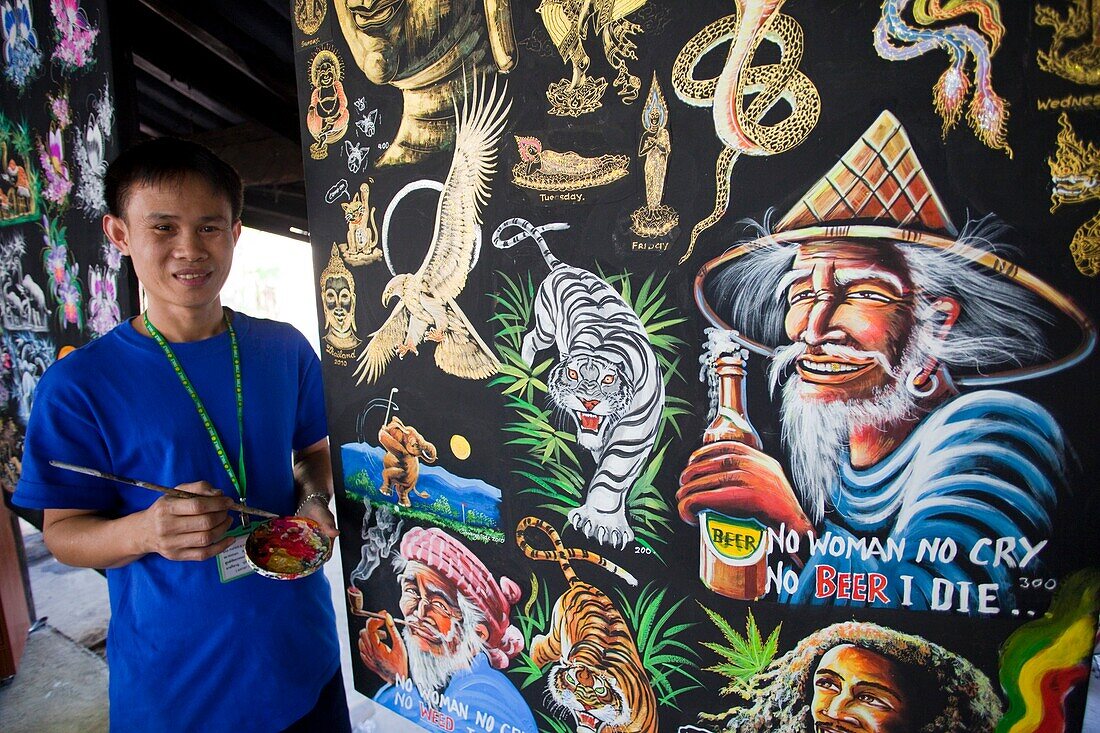 Thailand,Chiang Mai,Borsang Umbrella Village,Umbrella Artist with Artwork Sample Display