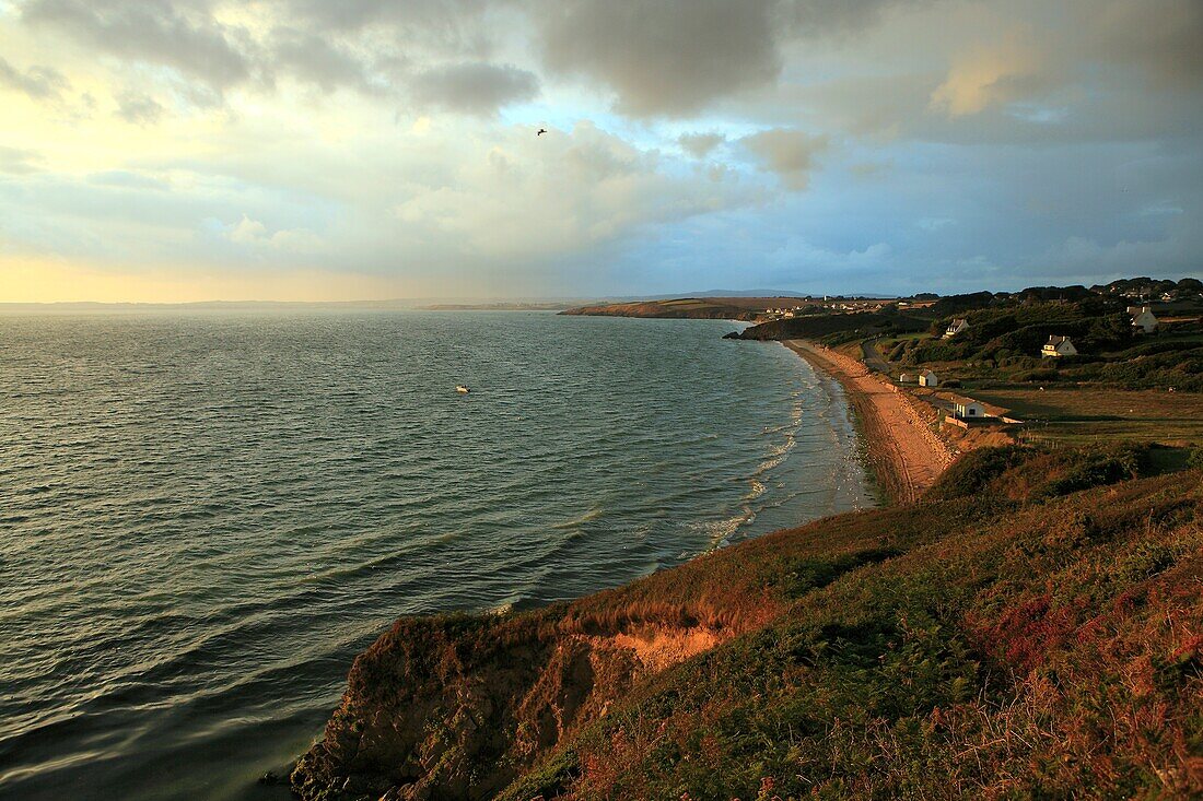 France, Finistère (29), Bay of Douarnenez, the sandy coast to Plomodiern, group of houses facing the sea, at sunset