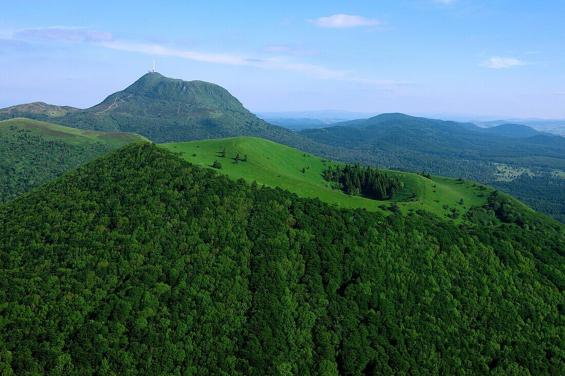 France, Puy de Dome (63), the Puy de Dome volcano is 1465 meters, of the Puys, labeled Grand Site de France, at the forefront of the Puy Pariou (aerial view)