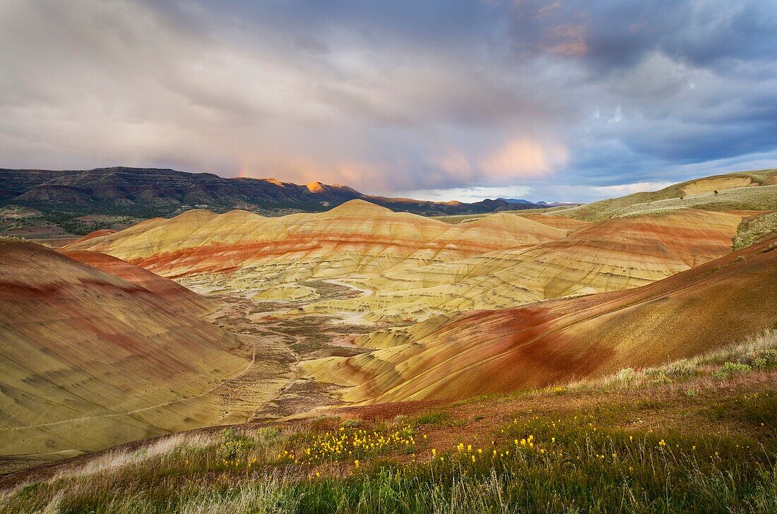 Passing storm at sunset Painted Hill Unit of John Day Fossil Beds National Monument Oregon