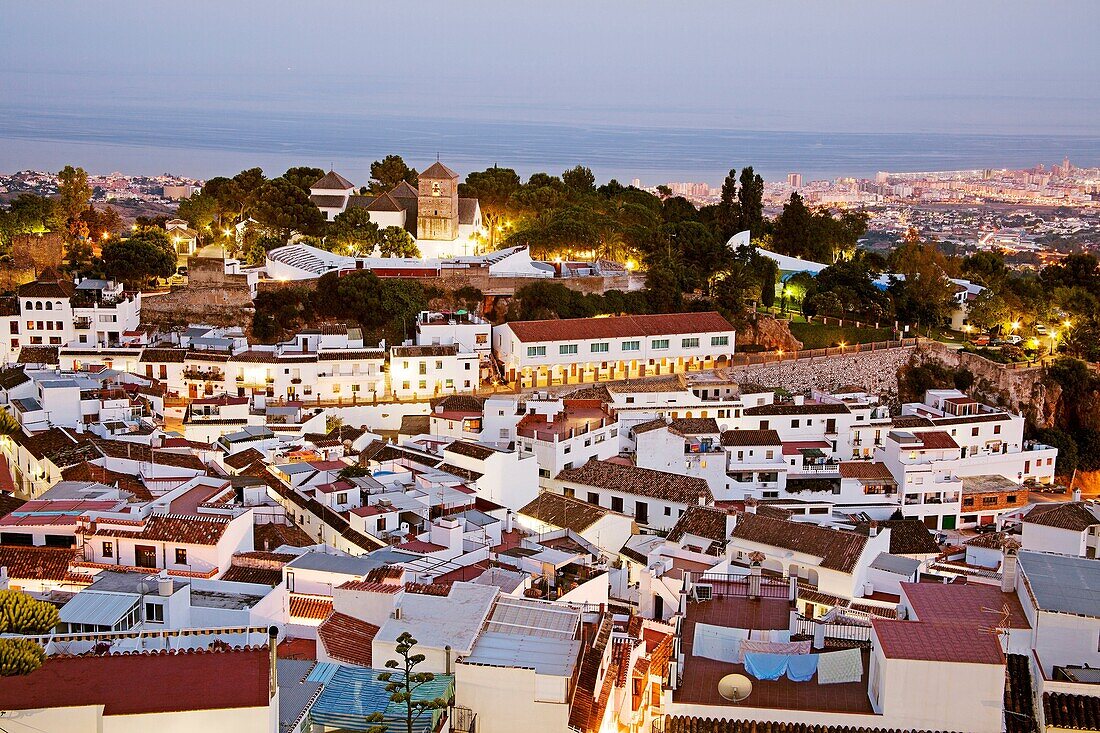 White village of Mijas at dusk, Malaga Province, Costa del Sol, Andalusia, Spain.