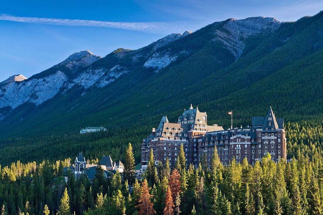 The imposing Banff Springs Hotel with Bow River, Banff National Park, Alberta, Canada