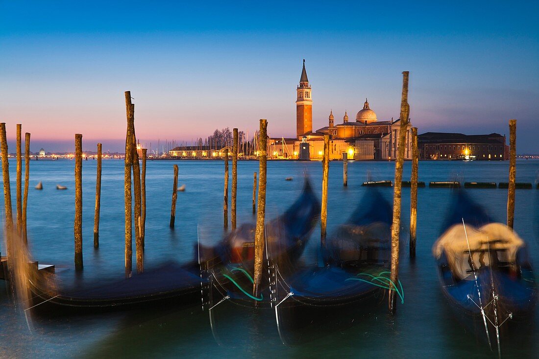 Sunrise over San Giorgio Maggiore with gondolas in the foreground, Venice, Italy, Europe