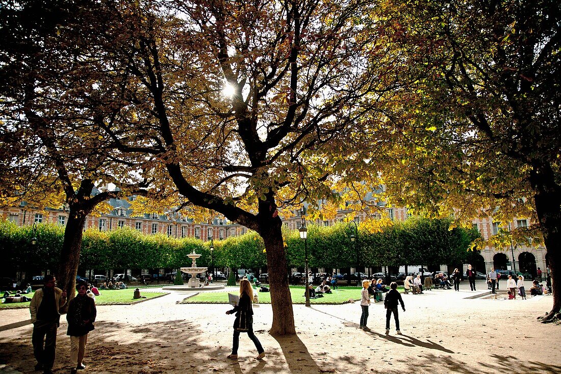 Place des Vosges in Le Marais, Paris, France  First planned square in the city, inaugurated by Louis XIII in 1612