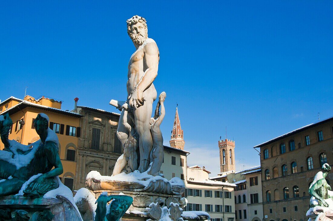 The Neptune Biancone fountain with snow during winter time, Firenze, Tuscany, Italy, UNESCO World Heritage Site