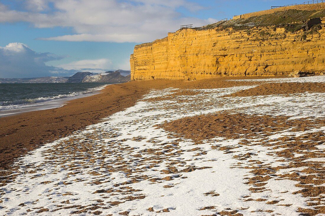 Very Rare scene of Snow on the Beach at Burton Bradstock Dorset
