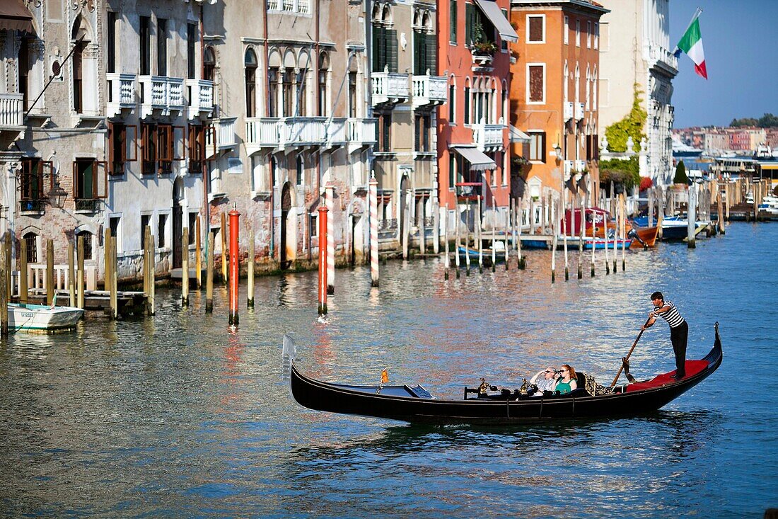 Gondolier at work, Grand Canal, Venice, Italy