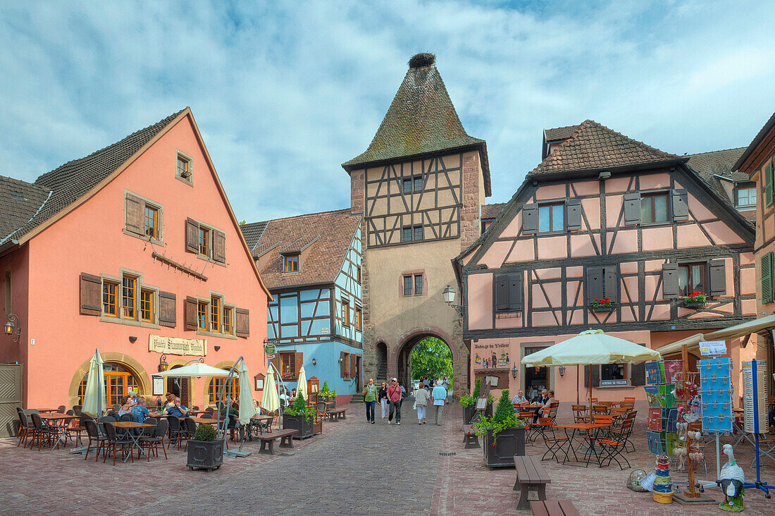 Untertor with half timbered houses under clouded sky, Turckheim, Alsace, France, Europe