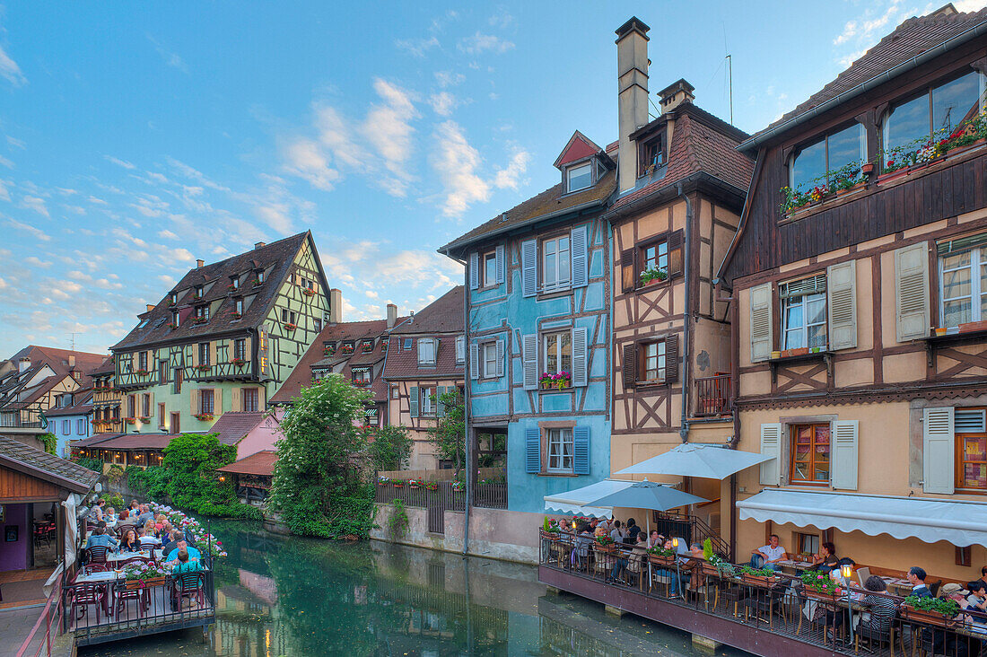 Restaurant and half timbered houses at the Lauch river, Little Venice, Colmar, Alsace, France, Europe