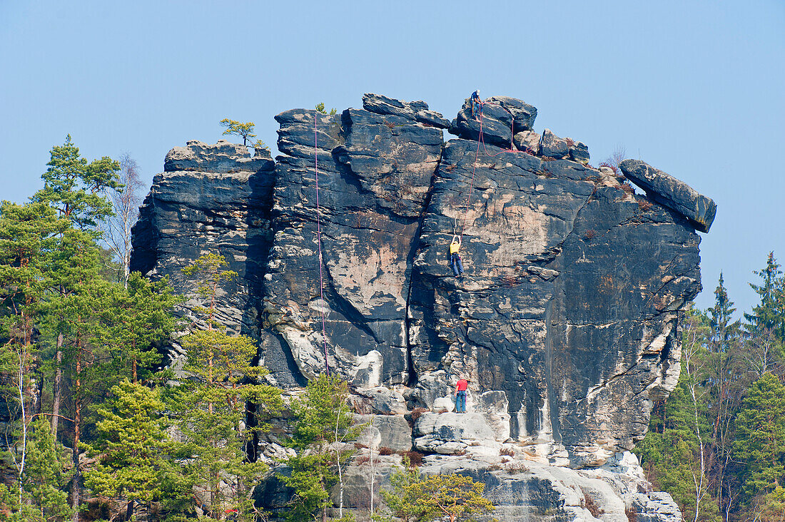 Rock climbers at a rock face, Elbe Sandstone mountains, Saxon Switzerland, Saxony, Germany, Europe