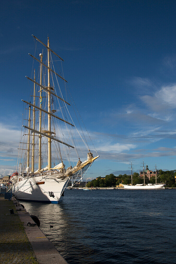 Sailing cruise ship Star Flyer with af Chapman sailing ship hostel in a distance, Stockholm, Stockholm, Sweden, Europe