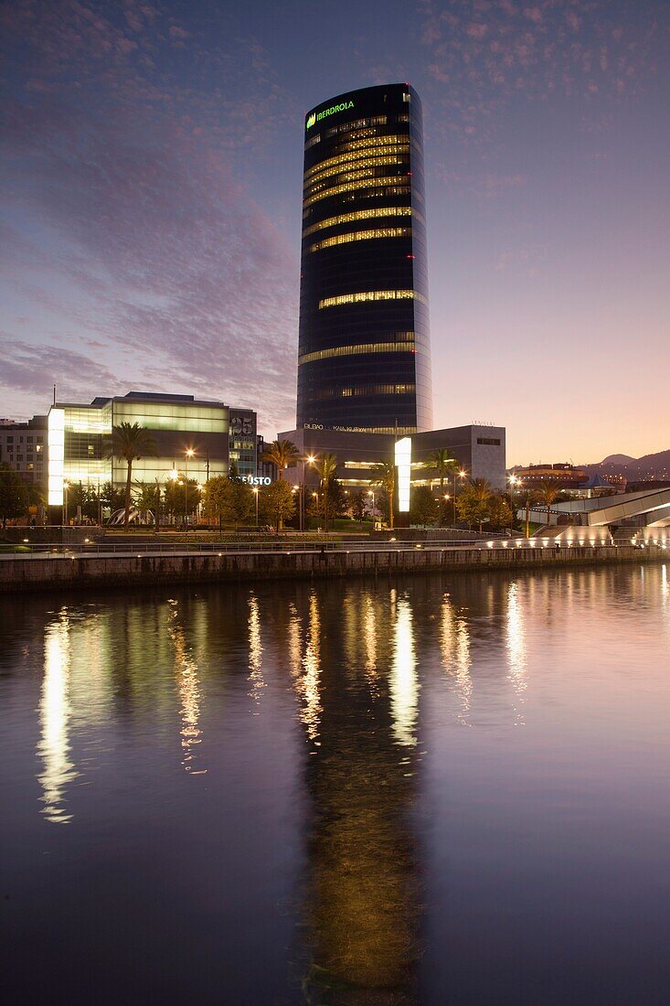 Spain, Basque Country Region, Vizcaya Province, Bilbao, Office Tower designed by Cesar Pelli, dusk
