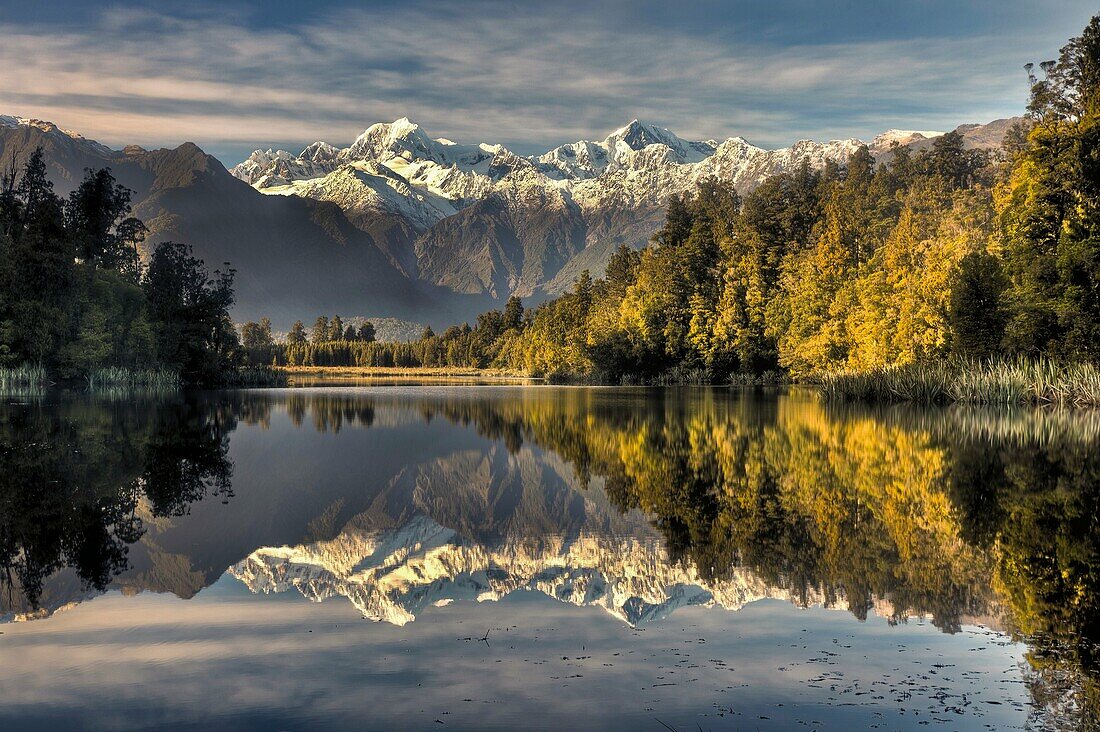 Lake Matheson dawn reflection, Mt Tasman left and Aoraki / Mt Cook, near Fox Glacier, Westland National Park , West Coast