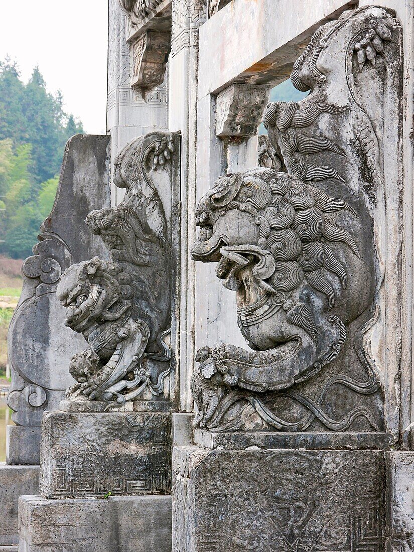 Deatil of a stone archway. First built during the Huangyou era 1049–1053 of Song Dynasty Emperor Renzong, the village was originally called Xichuan West River, owing to the various water courses flowing through it  The rise of the village was closely tied