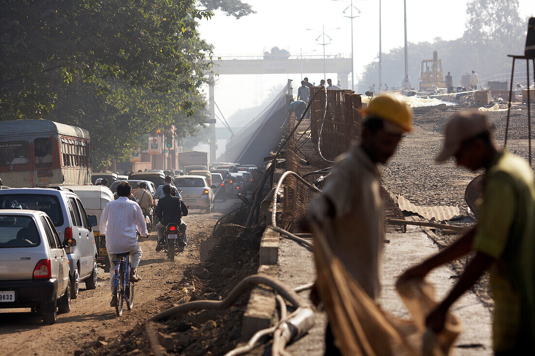 Traffic and roadworks on a city flyover highway in Pune, Maharashtra, India