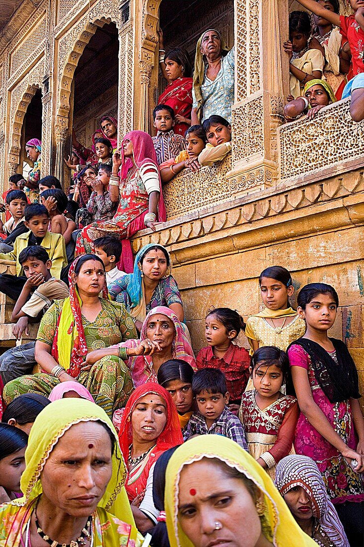 Gangaur festival,people watching a parade inside the Fort near Raj Mahal Royal Palace,Jaisalmer, Rajasthan, India