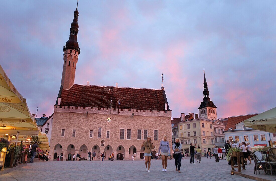 Medieval town hall in Town Hall Square,at right belltower of St Nicholas church,Tallinn,Estonia