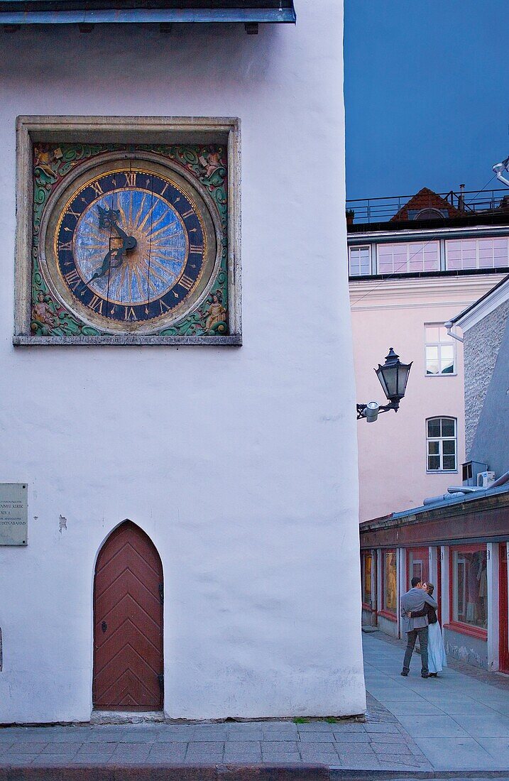 Couple kissing in front of Holy Spirit Church,Tallinn, Estonia