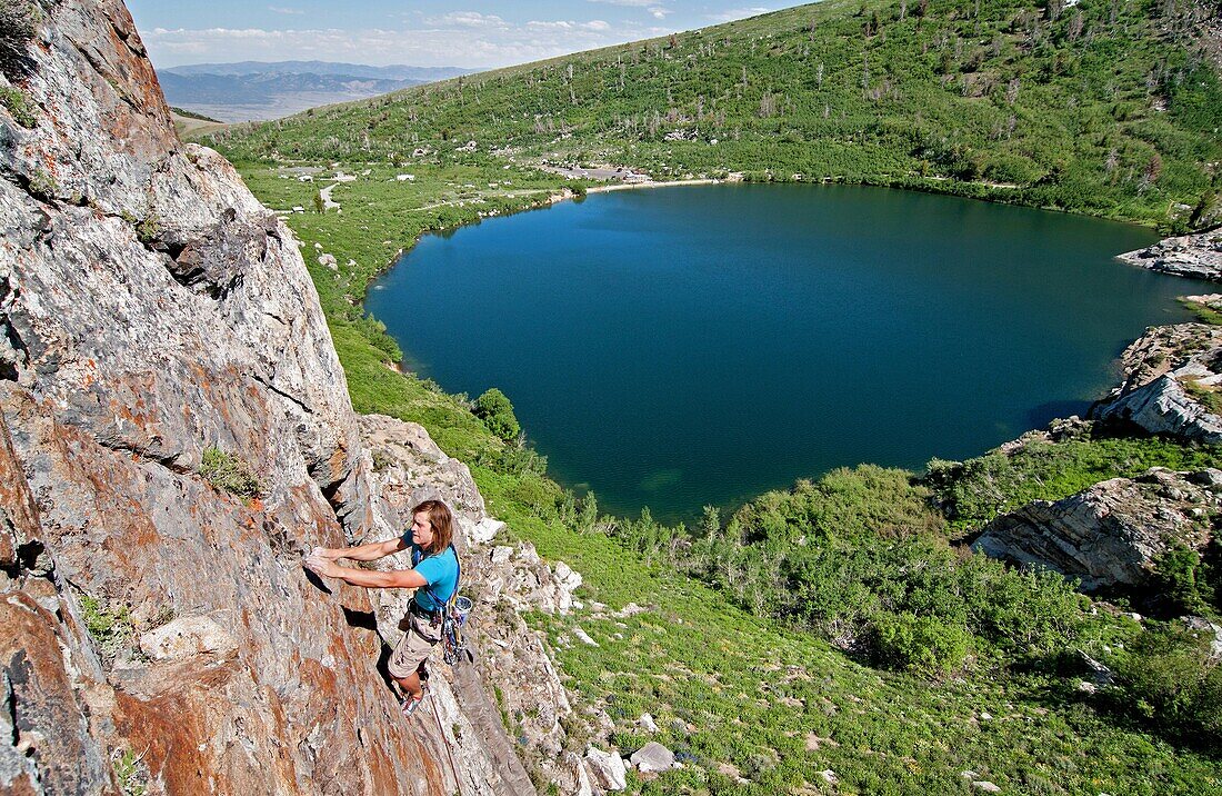 Nic Houser rock climbing a route called Angel Toes which is rated 5,10 and located on The Angel Lake Crag above Angel Lake high in the East Humboldt Mountains of northern Nevada