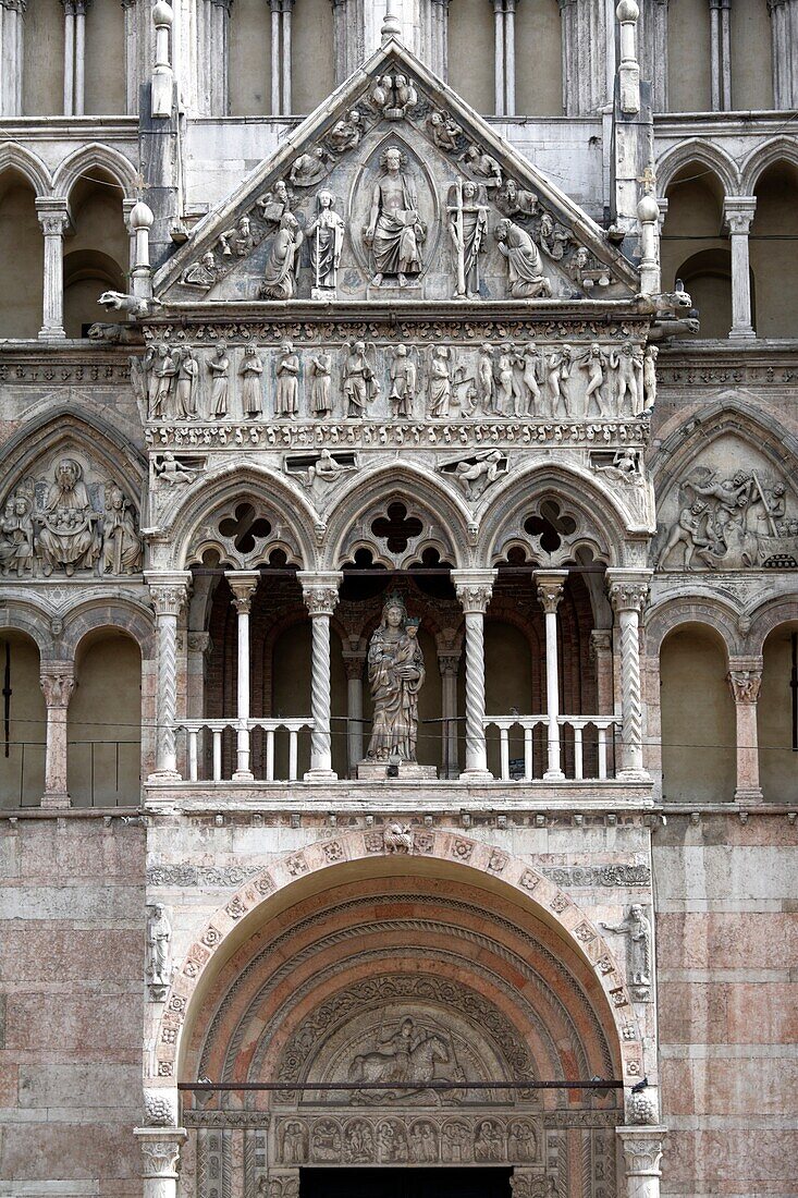 The loggia with a ´Madonna with Child´ on the facade of San Giorgio cathedral, Ferrara, Italy