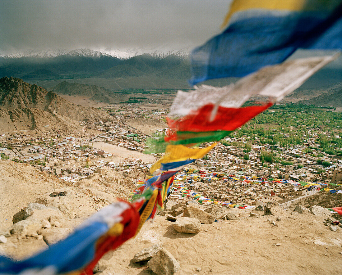 View through Buddhist prayer flags over capital Leh, Indus valley   Ladakh, Jammu and Kashmir, India