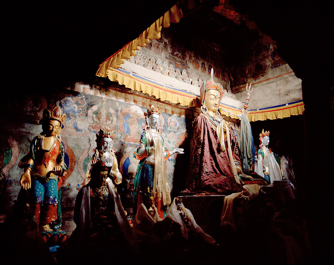 Buddha statues on the shrine at convent Temisgam, Chenrezig Gompa, Sham Trek, Ladakh, Jammu and Kashmir, India