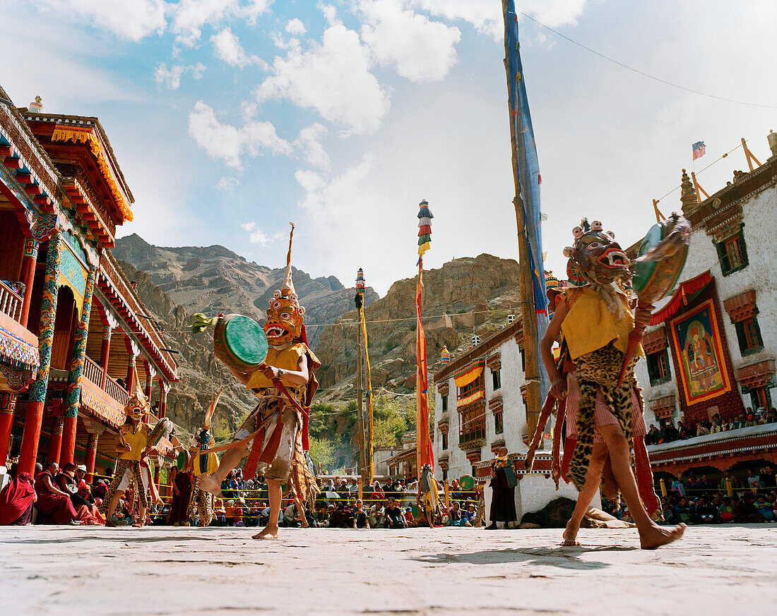 Dance of masks in the courtyard during the Hemis Gonpa Festival at convent Hemis, southeast of Leh, Ladakh, Jammu and Kashmir, India