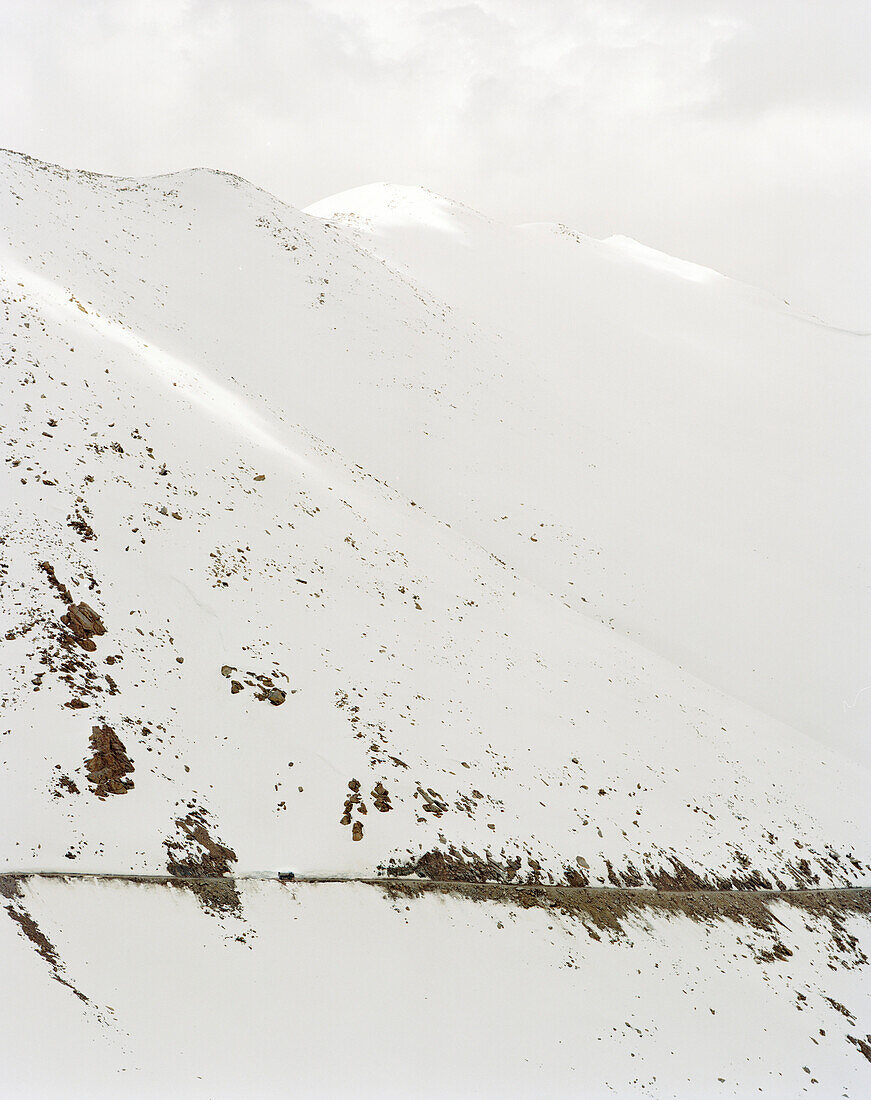 Street to the Khardung La, worlds highest road at 5570m above sea level, north of Leh, Ladakh, Jammu and Kashmir, India