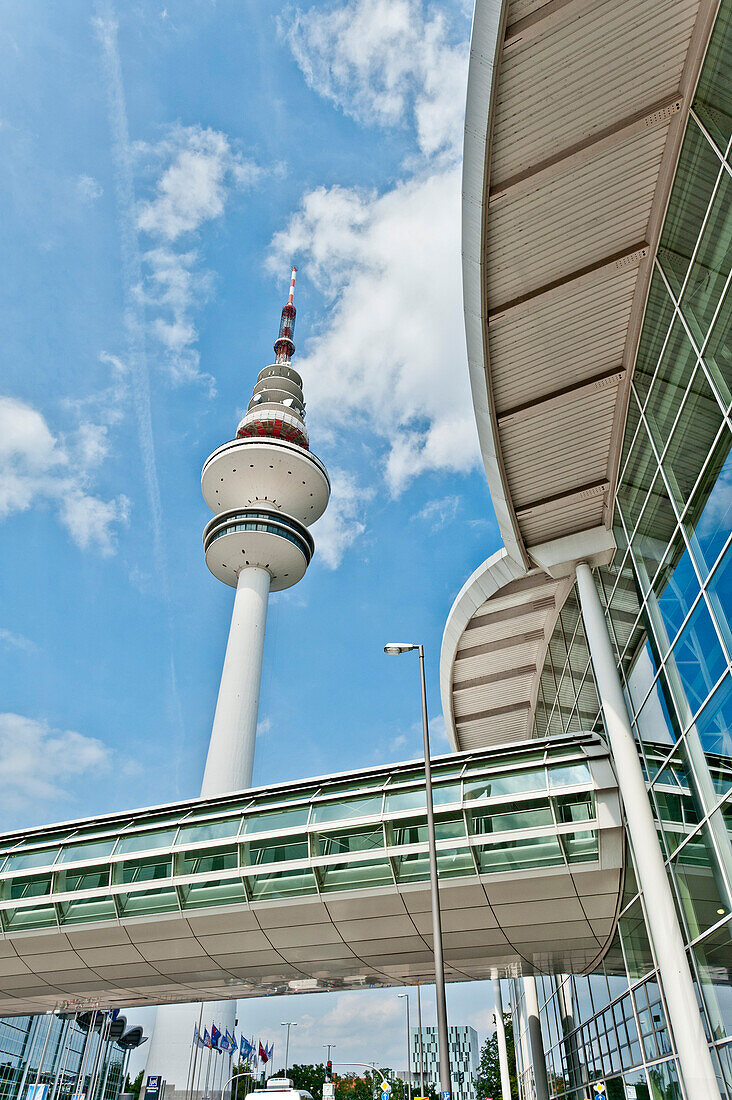 Television tower at the fair under white clouds, Hamburg, Germany, Europe