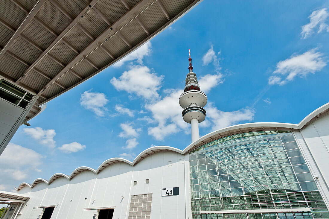 Television tower at the fair under white clouds, Hamburg, Germany, Europe