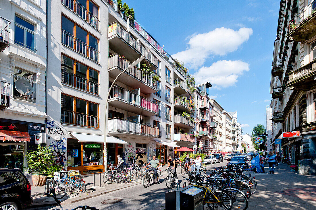 Houses and cyclists at the Martstrasse, Schanzenviertel, Hamburg, Germany, Europe