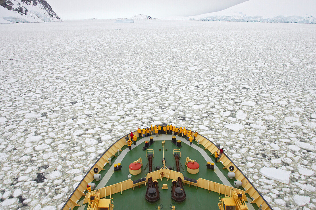 High angle view of icebreaker pushing through pack ice, Antarctica