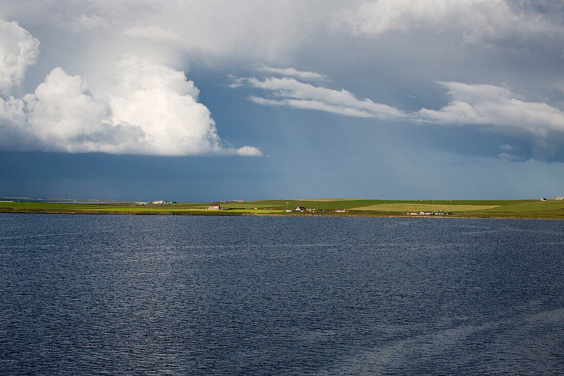 Coastline and storm clouds, Kirkwall, Orkney Islands, Scotland, United Kingdom