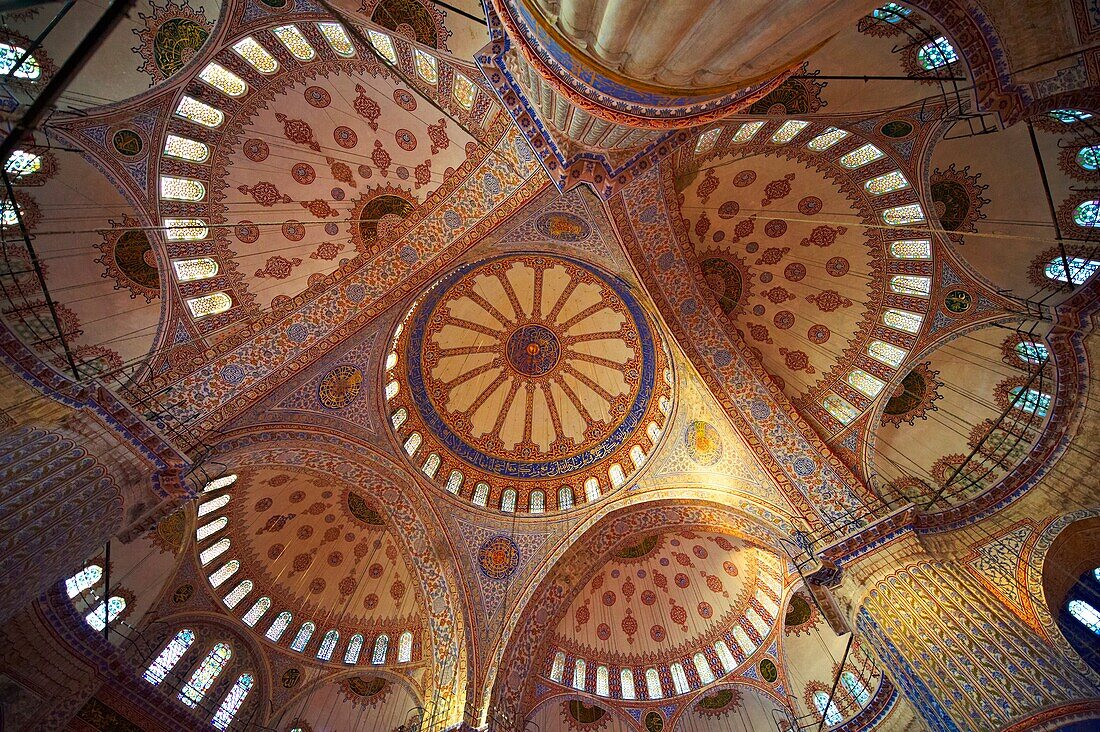 Interior of The Sultan Ahmed Mosque Sultanahmet Camii or Blue Mosque, Istanbul, Turkey  Built from 1609 to 1616 during the rule of Ahmed I the interior is decorated with Iznik tiles
