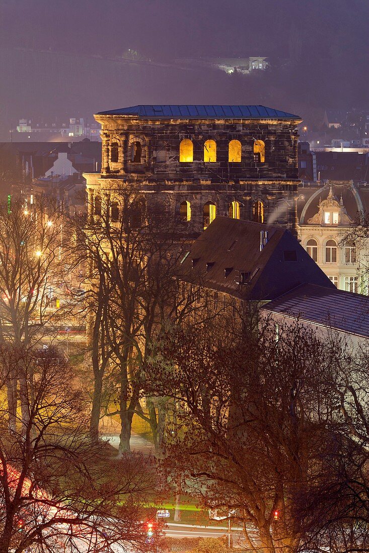 Porta Nigra, World Heritage Site, illuminated at night, Trier, Germany