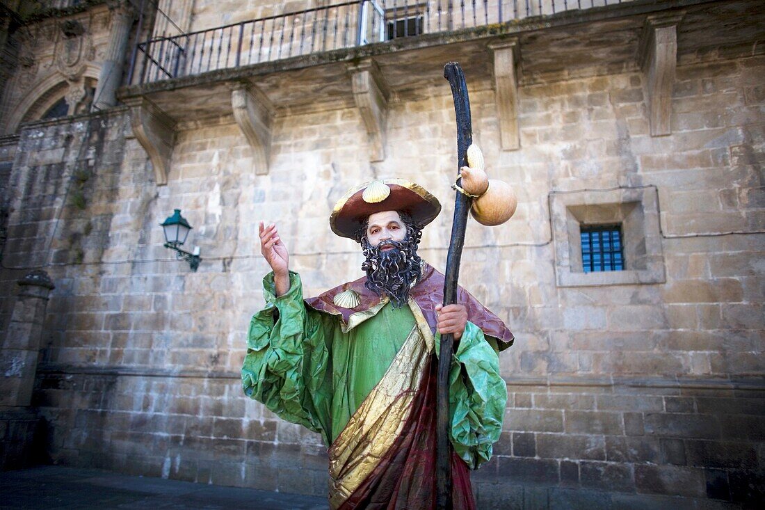 A mime dressed as St James the Apostle stands in the Obradoiro square of Santiago de Compostela, Spain. Hundred of thousands pilgrims walk every year to Santiago de Compostela using the French Way in the pilgrimage known as the Way of Saint James
