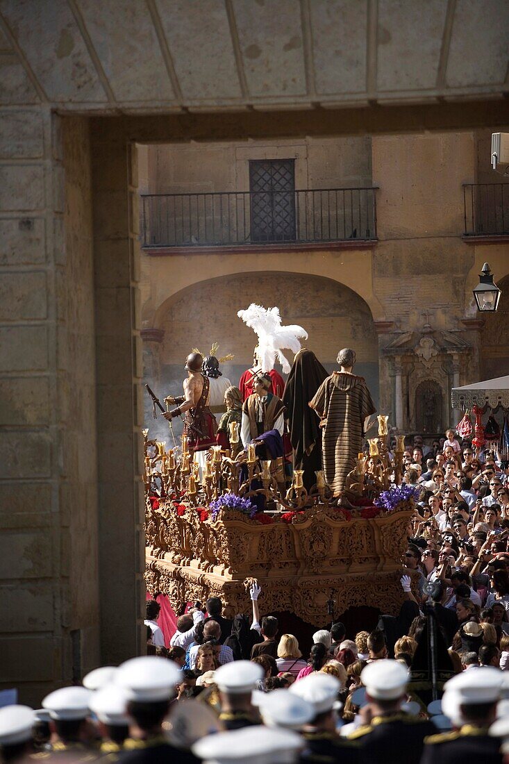 The Jesus del Silencio brotherhood throne crosses the Gate of the Roman Bridge, also known as the Arch of the Triumph during an Easter Holy Week procession in Cordoba, Andalusia, Spain, April 17, 2011
