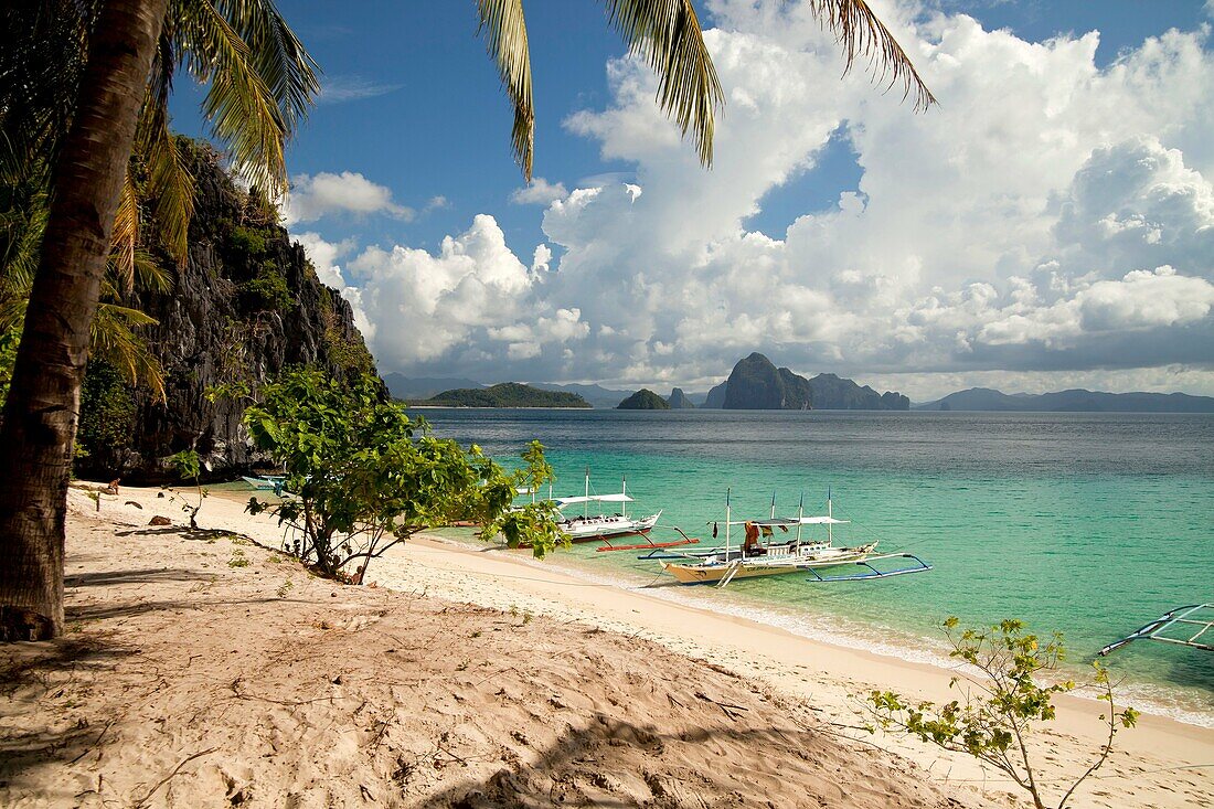 outrigger boats at Seven Commando Beach near El Nido, Palawan, Philippines, Asia