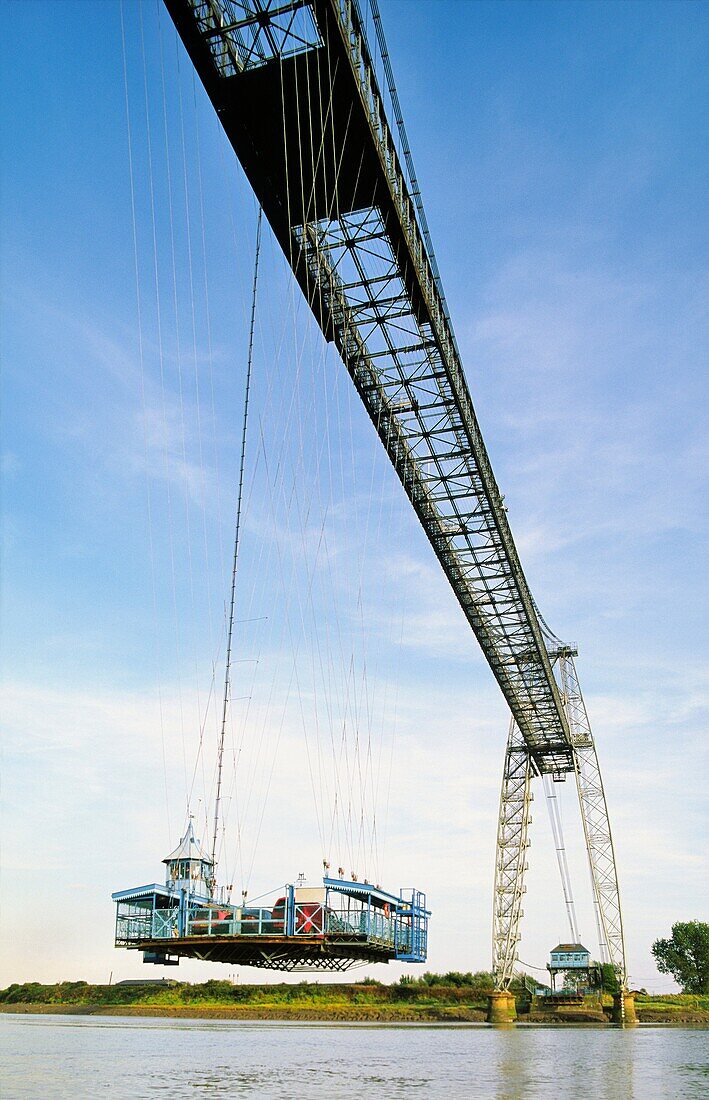 The Transporter Bridge, built 1906, carries vehicles and passengers over the River Usk in city of Newport in south Wales, UK