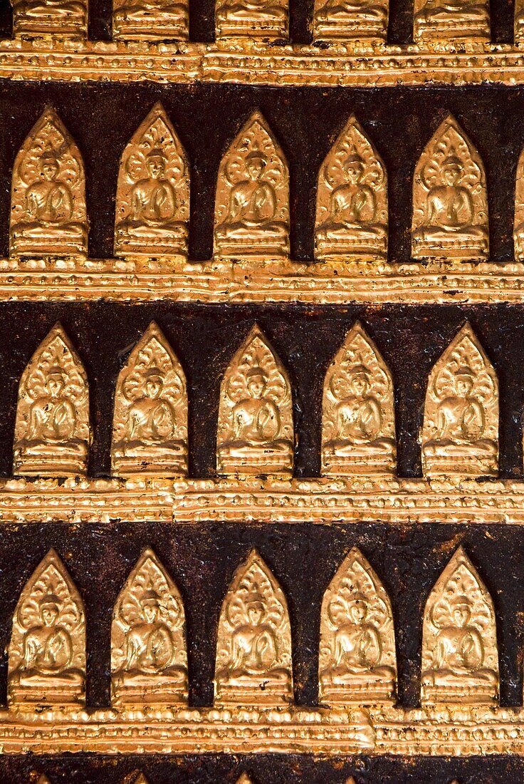 Laos, Luang Prabang, Wat Xieng Thong, Reclining Buddha Shrine Red Chapel, interior, golden Buddha images