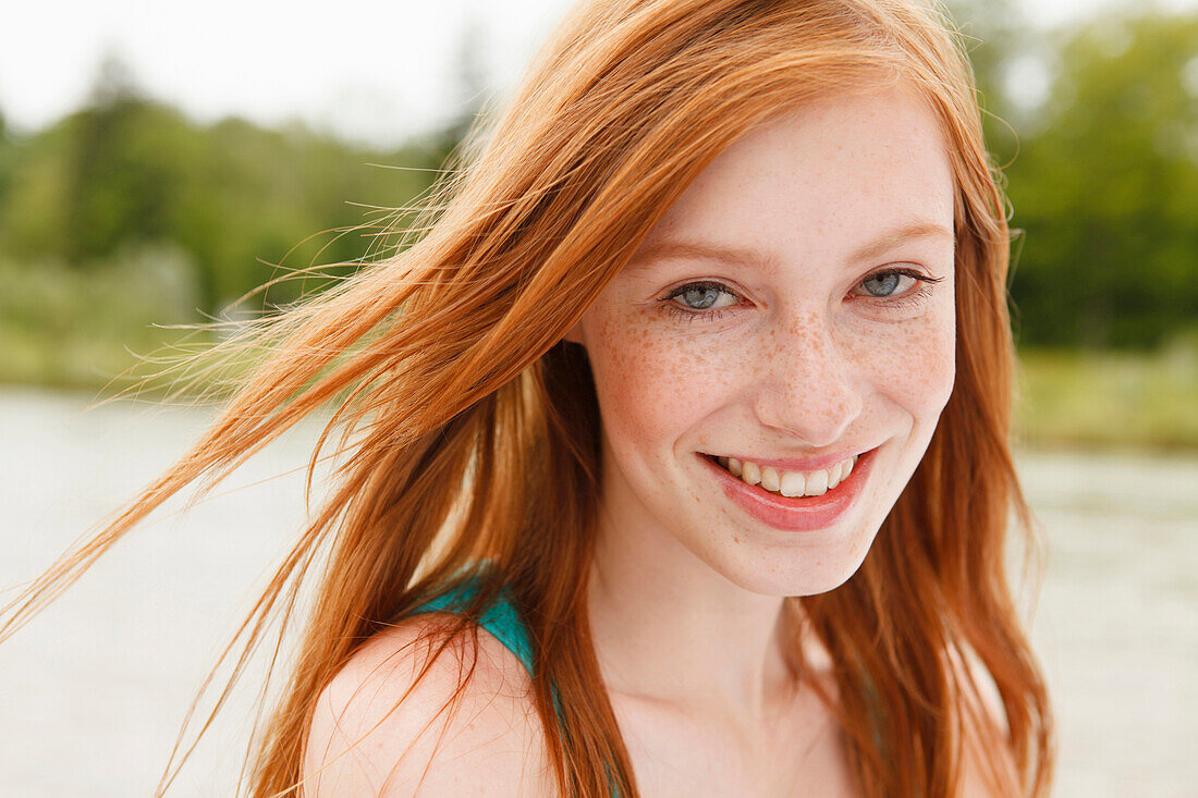 Young woman smiling at camera, Munich, Bavaria, Germany